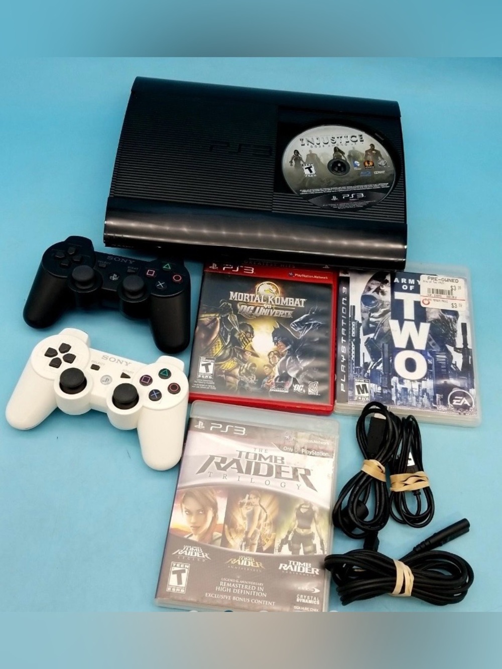 Sony PS3 Super Slim Console Bundle with Dual Controllers & 4 Games